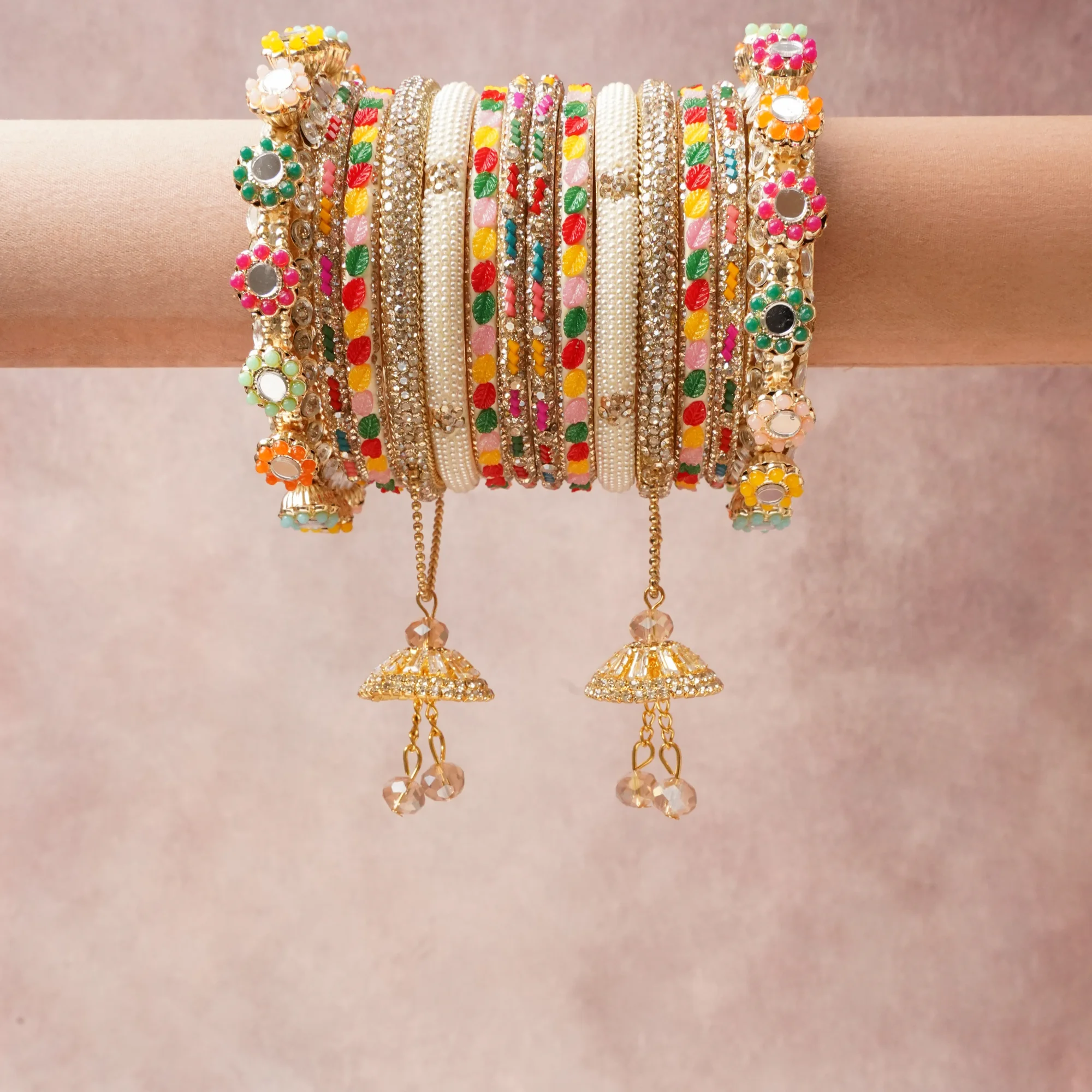 A commanding Multi colour anchors this beautiful set, enriched with accents of Gold, Clear, Pink, Red, Orange, Yellow, Green, Blue, Purple, Black, Silver that add depth and dimension.

Featuring a striking composition of Gold-toned Metal, Faux Pearls, Rhinestones, Enamel, Mirrors, Glass Beads, this set carries intricate craftsmanship and strong presence. Grand in form, it is created for moments that deserve to be marked.